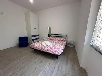Letto o letti in una camera di Il tuo Rifugio in Città