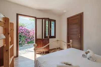 Letto o letti in una camera di Mandorletti Essence - Private Courtyard & Nature