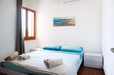 Letto o letti in una camera di Seafront Solanas