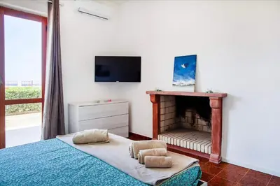 Letto o letti in una camera di Seafront Solanas