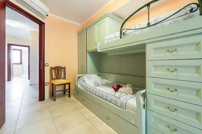 Letto o letti in una camera di Casa Coko