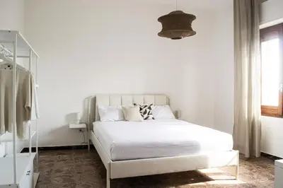 Letto o letti in una camera di Dimora Oro - Slow Life in Sardinia