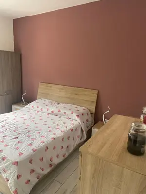 Letto o letti in una camera di Appartamento casa Dalia