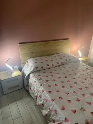 Letto o letti in una camera di Appartamento casa Dalia