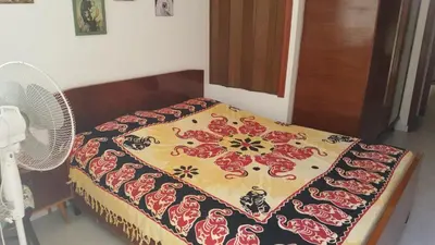 Letto o letti in una camera di Casa di Nonna