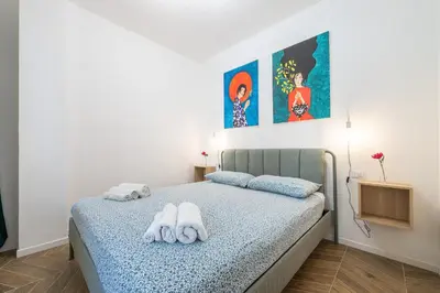 Letto o letti in una camera di Cugia 14 - Cagliari Center House
