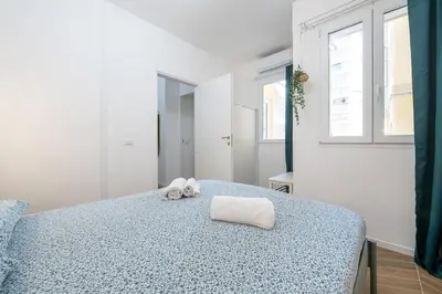 Letto o letti in una camera di Cugia 14 - Cagliari Center House
