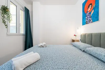 Letto o letti in una camera di Cugia 14 - Cagliari Center House