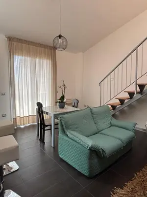 Area soggiorno di Flat 5