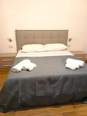 Letto o letti in una camera di Casa Vacanze Alma