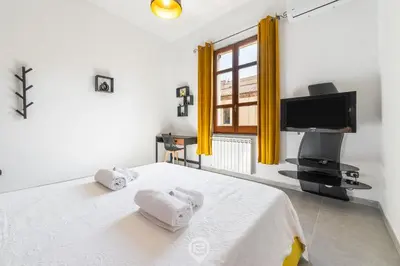 Letto o letti in una camera di Cagliari Shopping District Flat