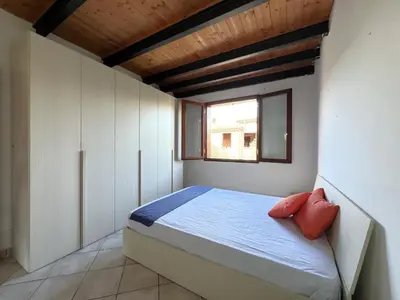 Letto o letti in una camera di CasaGiuVaLeo