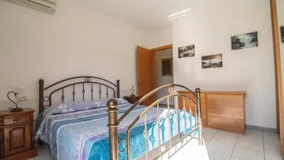 Letto o letti in una camera di Domus Peppi