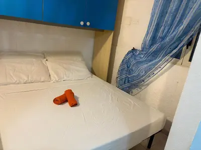 Letto o letti in una camera di La Stanza del Mare
