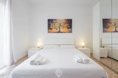 Letto o letti in una camera di Casa Elvira