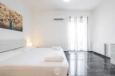 Letto o letti in una camera di Casa Elvira