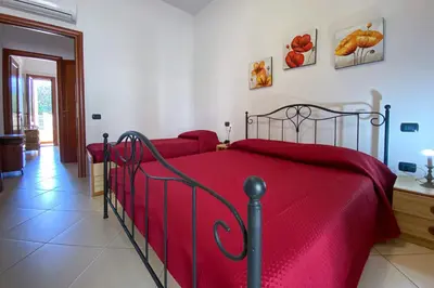 Letto o letti in una camera di Casa Savina