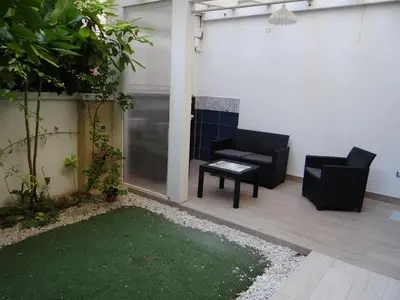 Patio o area all'aperto di Casa Cinzia con piccolo giardino