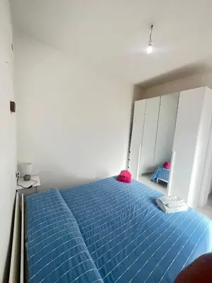 Letto o letti in una camera di Egidio's House Casa Vacanze Portixeddu