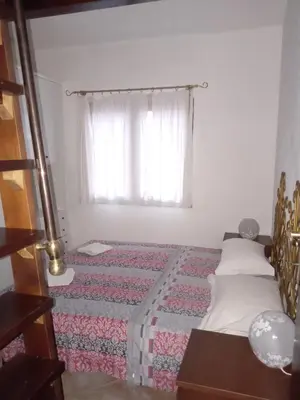 Letto o letti in una camera di casa relax a chia