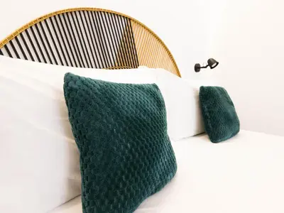 Letto o letti in una camera di The Quarters