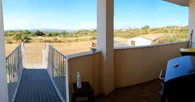 Balcone o terrazza di Oasi Relax Casa Vacanze Sant'Antioco P1
