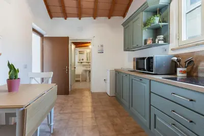 Cucina o angolo cottura di GuestHost - Sa Domo de Murera - Sardinian House