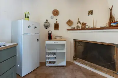 Cucina o angolo cottura di GuestHost - Sa Domo de Murera - Sardinian House