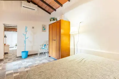 Letto o letti in una camera di GuestHost - Sa Domo de Murera - Sardinian House