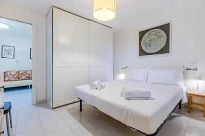 Letto o letti in una camera di Eden di Chia - Beach house in Private Residence