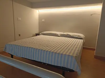 Letto o letti in una camera di Appartamento a Cagliari