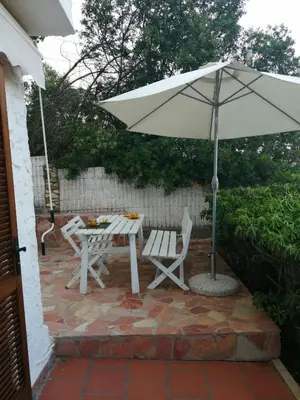 Patio o area all'aperto di La terrazza sul blu - intero appartamento con vista Costa Rei
