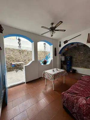 Letto o letti in una camera di Appartamento con patio