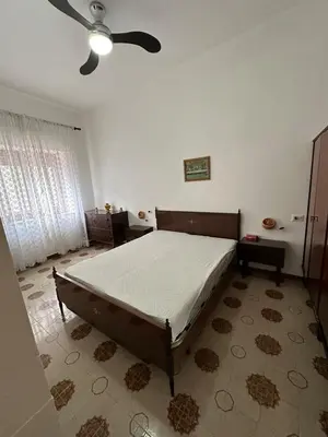 Letto o letti in una camera di Appartamento con patio