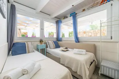 Letto o letti in una camera di Nido sul Mare