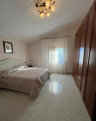 Letto o letti in una camera di Villa l oleandro