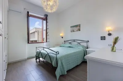 Letto o letti in una camera di GuestHost - Roby's Home
