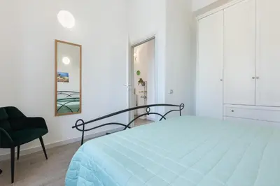 Letto o letti in una camera di GuestHost - Roby's Home