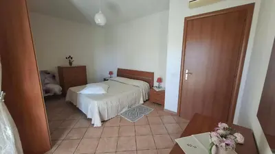 Letto o letti in una camera di Casa nonna Elvia Elvia's Grandma home