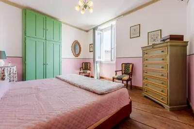 Letto o letti in una camera di GuestHost - La Meridiana