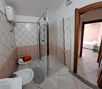Bagno di L'oasi - Monolocale con giardino in Sardegna