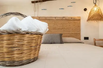 Letto o letti in una camera di Bixinau Camere Museo