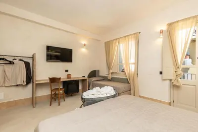 Letto o letti in una camera di Bixinau Camere Museo