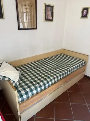Letto o letti in una camera di Domu de Mari