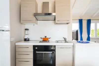 Cucina o angolo cottura di Charming Loft with Large Terrace