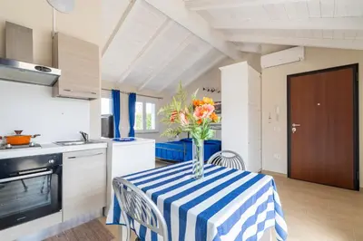 Cucina o angolo cottura di Charming Loft with Large Terrace
