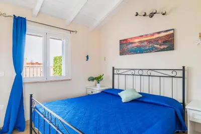 Letto o letti in una camera di Charming Loft with Large Terrace