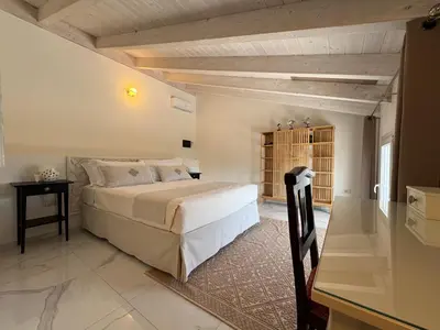 Letto o letti in una camera di Tenuta Feraxi - Private Paradise
