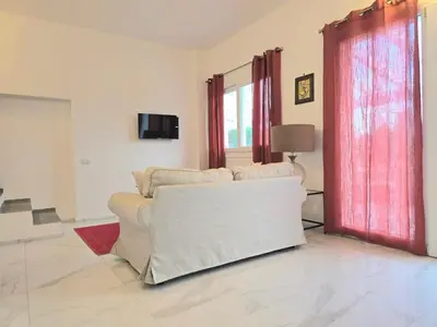 TV o dispositivi per l'intrattenimento presso Tenuta Feraxi - Private Paradise