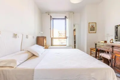 Letto o letti in una camera di GuestHost - Ely's Home Cagliari